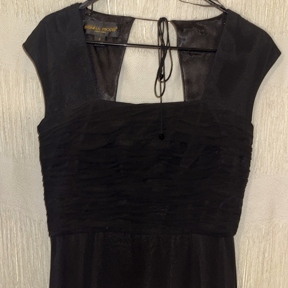 Sheer black dress. Cap sleeves.